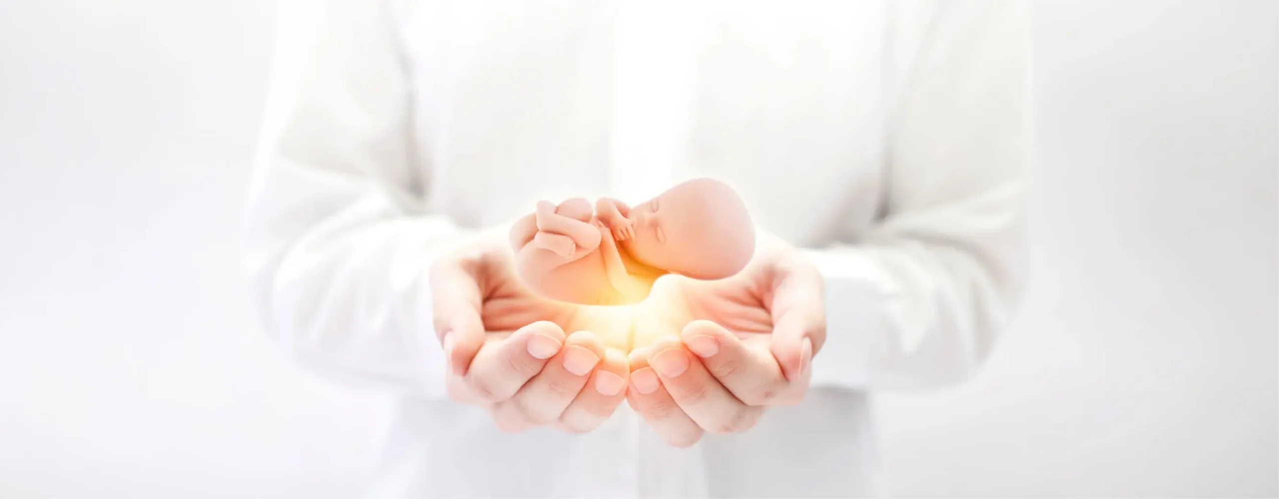 Doctor holding embryo symbol – representing advanced fertility care at Neev IVF.